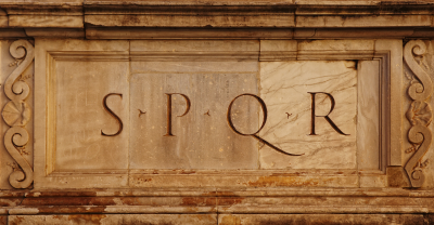 The initials SPQR carved in stone